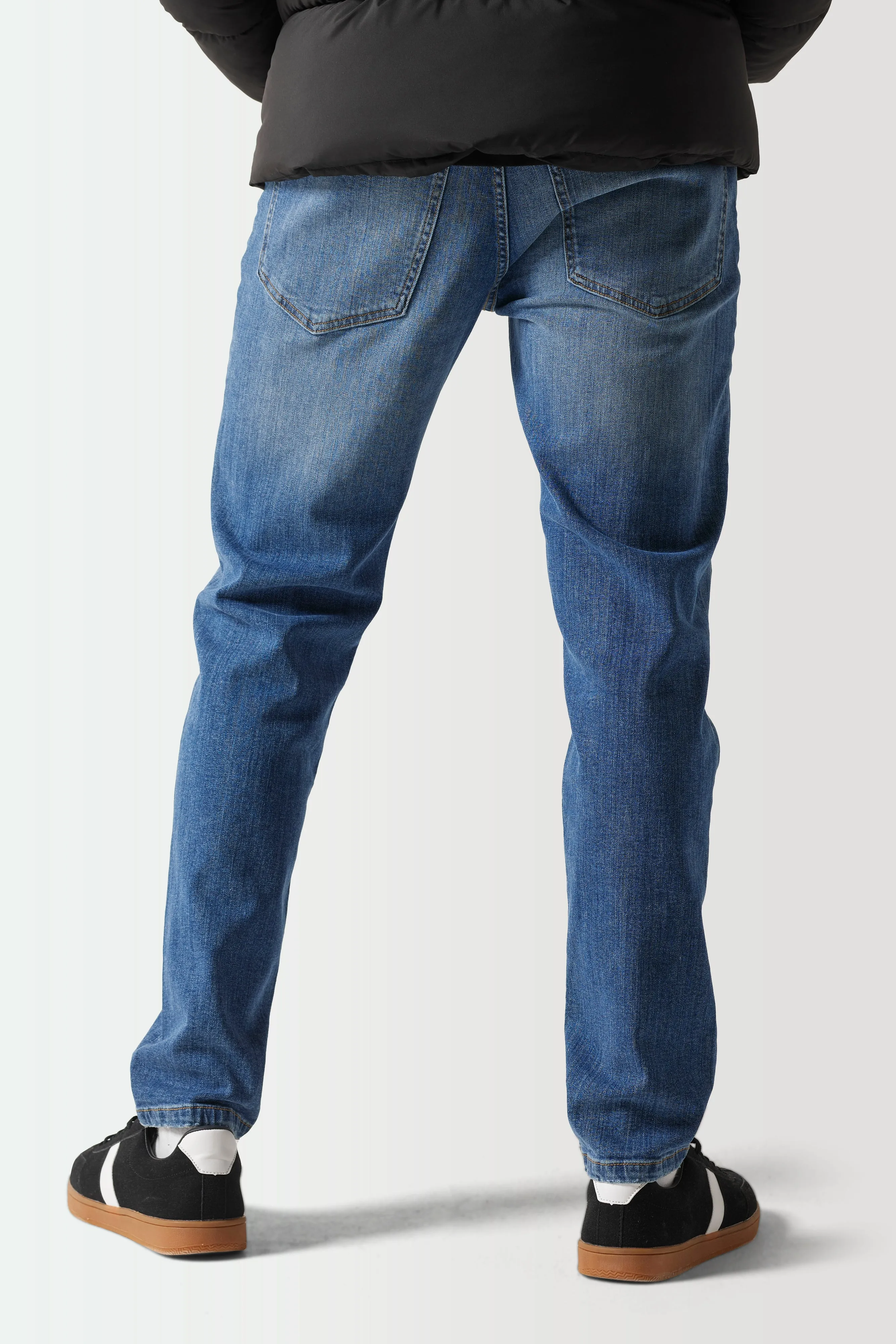 Sustainable Distressed Slim Tapered Jeans - Mid Wash